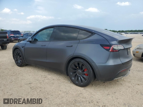 2022 Tesla Model Y Performance with VIN 7SAYGDEF2NF460730, listed as a Copart auction lot 54127945 with 59,735 mi miles and Salvage title. Bid and sale history available at DreamBid. Image 2.