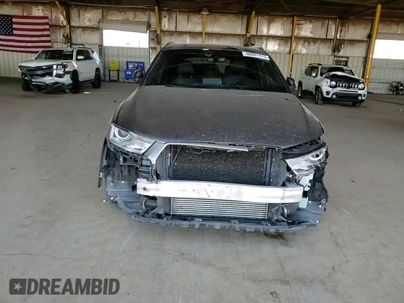 2018 Audi Q3 Premium with VIN WA1ECCFS8JR021306, listed as a Copart auction lot 60091415 with 100,604 mi miles and Salvage title. Bid and sale history available at DreamBid. Image 13.