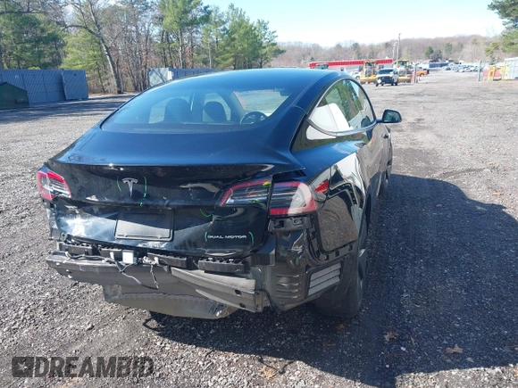2023 Tesla Model 3 Long Range with VIN 5YJ3E1EB1PF392027, listed as a IAAI auction lot 41983638 with 31,415 mi miles and . Bid and sale history available at DreamBid. Image 4.
