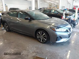 2020 Nissan Maxima S z VIN 1N4AA6BV1LC379905, wystawiony jako IAAI lot #41381129 z przebiegiem 56 046 mil mil oraz . Historia ofert i sprzedaży dostępna na DreamBid. Obrazek 1.