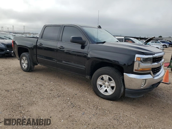 2018 Chevrolet Silverado 1500 LT with VIN 3GCUCRER4JG192458, listed as a Copart auction lot 56179635 with 96,450 mi miles and Clean Title. Bid and sale history available at DreamBid. Image 4.