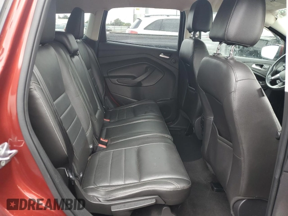 2016 Ford Escape Titanium with VIN 1FMCU9J91GUA99767, listed as a Copart auction lot 51172655 with 132,911 mi miles and Salvage title. Bid and sale history available at DreamBid. Image 11.