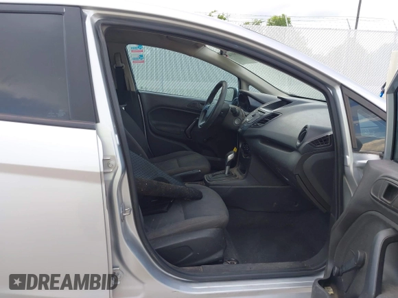 2014 Ford Fiesta S with VIN 3FADP4AJ6EM211807, listed as a IAAI auction lot 42601443 with 163,459 mi miles and . Bid and sale history available at DreamBid. Image 5.