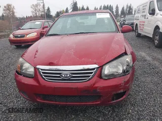 2009 Kia Spectra EX with VIN KNAFE222695621925, listed as a IAAI auction lot 40657622 with 135,647 mi miles. Bid and sale history available at carsss.com. Image 6.
