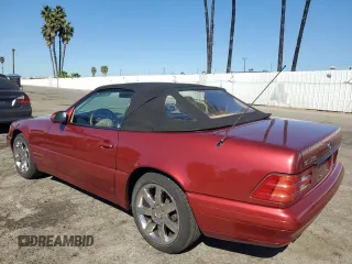 1999 Mercedes-Benz SL-Class with VIN WDBFA68F3XF184908, listed as a Copart auction lot 77165784 with 67,408 mi miles and Salvage Title. Bid and sale history available at carsss.com. Image 2.