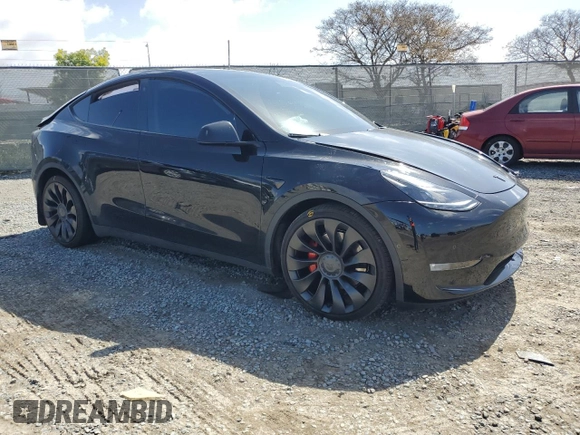 2022 Tesla Model Y Performance with VIN 7SAYGDEF5NF443274, listed as a Copart auction lot 49581905 with Not provided miles and Salvage title. Bid and sale history available at DreamBid. Image 4.
