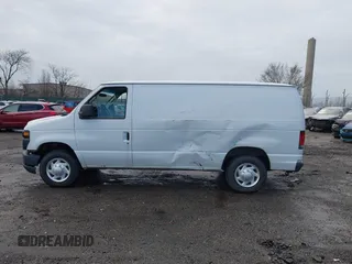 2013 Ford Econoline Cargo Commercial with VIN 1FTNE1EW2DDB11061, listed as a IAAI auction lot 41808318 with 230,677 mi miles. Bid and sale history available at carsss.com. Image 13.