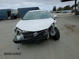 2014 Toyota Corolla L with VIN 2T1BURHE2EC010365, listed as a Copart auction lot 55887485 with 112,247 mi miles and Salvage title. Bid and sale history available at DreamBid. Image 14.