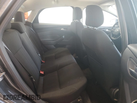 2018 Ford Focus SE z VIN 1FADP3F25JL257815, wystawiony jako Copart lot #61978045 z przebiegiem 62 328 mil mil oraz Szkoda całkowita • Salvage title. Historia ofert i sprzedaży dostępna na DreamBid. Obrazek 10.