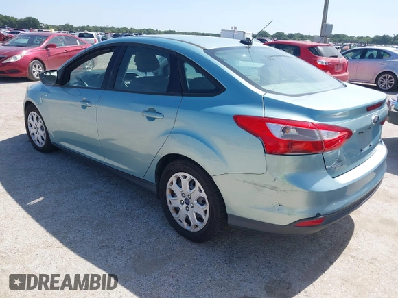 2012 Ford Focus SE z VIN 1FAHP3F22CL352952, wystawiony jako IAAI lot #42722671 z przebiegiem 126 923 mil mil oraz . Historia ofert i sprzedaży dostępna na DreamBid. Obrazek 3.