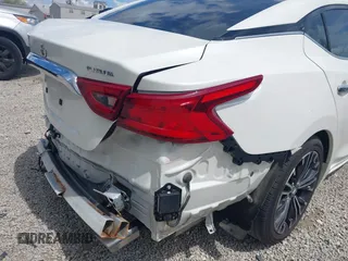2016 Nissan Maxima 3.5 SV with VIN 1N4AA6APXGC414322, listed as a IAAI auction lot 42061835 with 129,356 mi miles. Bid and sale history available at carsss.com. Image 19.