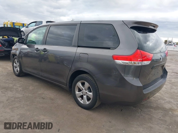 2012 Toyota Sienna with VIN 5TDKA3DC6CS011159, listed as a IAAI auction lot 41788426 with 246,133 mi miles and . Bid and sale history available at DreamBid. Image 3.
