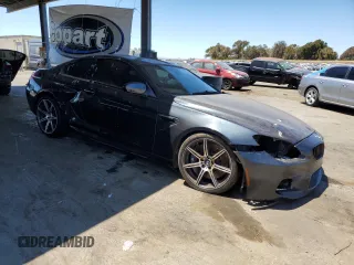 2014 BMW M6 z VIN WBSLX9C52ED160538, wystawiony jako Copart lot #64329095 z przebiegiem Nie podano mil oraz Szkoda całkowita • Salvage title. Historia ofert i sprzedaży dostępna na DreamBid. Obrazek 4.