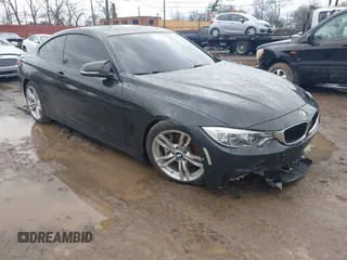 2014 BMW 4 Series 435i xDrive with VIN WBA3R5C57EK187561, listed as a IAAI auction lot 41722571 with 79,681 mi miles and . Bid and sale history available at carsss.com. Image 1.
