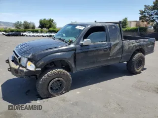 1999 Toyota Tacoma with VIN 4TAWN74N5XZ525647, listed as a Copart auction lot 57144845 with 344,241 mi miles and Salvage title. Bid and sale history available at DreamBid. Image 1.
