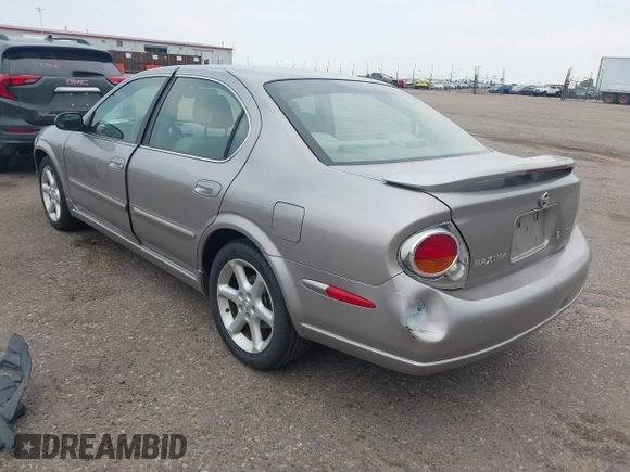 2003 Nissan Maxima SE with VIN JN1DA31DX3T521797, listed as a IAAI auction lot 42737605 with 150,045 mi miles and . Bid and sale history available at DreamBid. Image 3.
