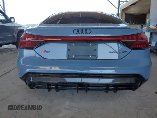 2022 Audi RS e-tron GT z VIN WAUAHBFW0N7902258, wystawiony jako Copart lot #63346114 z przebiegiem Nie podano mil oraz Szkody całkowita. Historia ofert i sprzedaży dostępna na DreamBid. Obrazek 6.