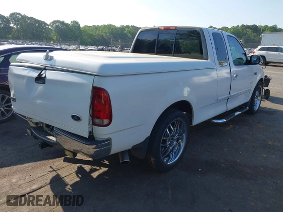 2000 Ford F-150 XL with VIN 1FTRX17L7YNB73649, listed as a IAAI auction lot 42159021 with Not provided miles and . Bid and sale history available at DreamBid. Image 4.