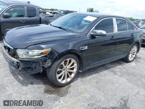 2013 Ford Taurus Limited with VIN 1FAHP2F84DG220283, listed as a IAAI auction lot 40045974 with 155,409 mi miles and . Bid and sale history available at DreamBid. Image 2.