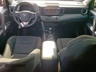 2018 Toyota RAV4 XLE with VIN 2T3RFREV7JW818661, listed as a Copart auction lot 65756615 with 56,369 mi miles and Salvage title. Bid and sale history available at DreamBid. Image 8.