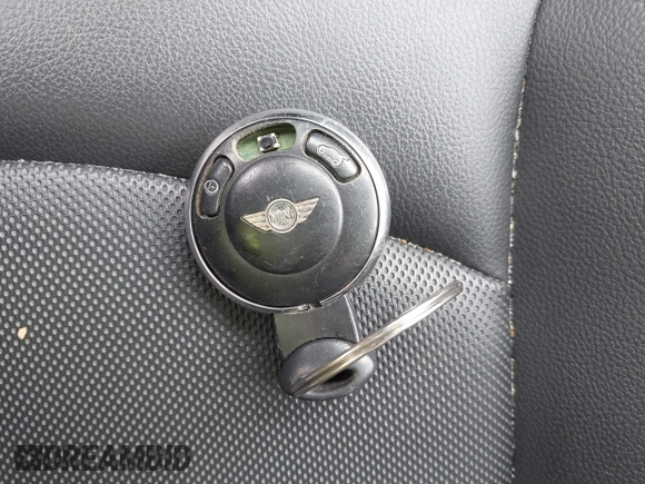 2012 MINI Countryman S with VIN WMWZC3C56CWM27592, listed as a IAAI auction lot 42175396 with 147,600 mi miles and . Bid and sale history available at DreamBid. Image 11.