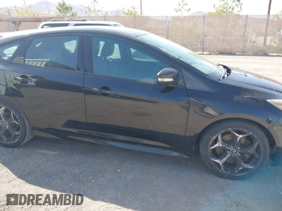 2014 Ford Focus ST with VIN 1FADP3L97EL199309, listed as a IAAI auction lot 41969919 with 174,344 mi miles and . Bid and sale history available at carsss.com. Image 14.
