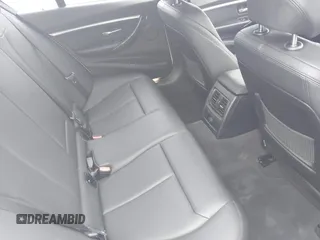 2018 BMW 3 Series 330i xDrive with VIN WBA8D9C52JEM32318, listed as a IAAI auction lot 42309352 with 61,828 mi miles and . Bid and sale history available at DreamBid. Image 8.