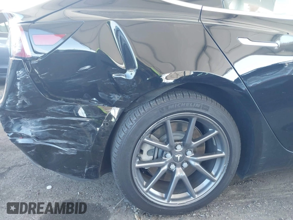 2020 Tesla Model 3 Standard Range Plus with VIN 5YJ3E1EA8LF661982, listed as a IAAI auction lot 41700109 with 30,271 mi miles and . Bid and sale history available at DreamBid. Image 18.
