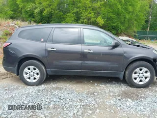 2015 Chevrolet Traverse LS z VIN 1GNKVFED2FJ133054, wystawiony jako IAAI lot #42252164 z przebiegiem 72 981 mil mil oraz . Historia ofert i sprzedaży dostępna na DreamBid. Obrazek 13.