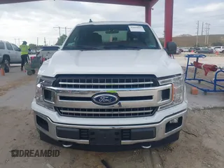 2019 Ford F-150 XL with VIN 1FTEW1E50KFA47687, listed as a IAAI auction lot 42021043 with 129,337 mi miles. Bid and sale history available at carsss.com. Image 12.