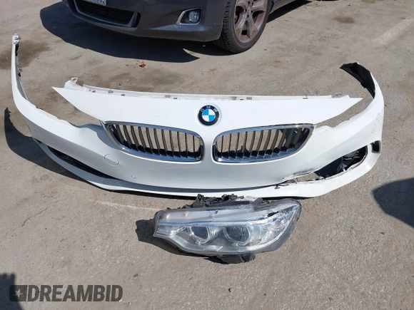2015 BMW 4 Series 428i with VIN WBA4A9C50FGL85857, listed as a IAAI auction lot 42542619 with 136,411 mi miles and . Bid and sale history available at DreamBid. Image 12.