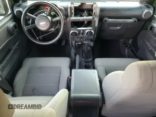 2008 Jeep Wrangler Unlimited Rubicon with VIN 1J8GA69168L591643, listed as a Copart auction lot 83655374 with 140,309 mi miles and Salvage Title. Bid and sale history available at carsss.com. Image 8.