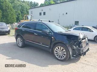 2017 Cadillac XT5 Platinum AWD with VIN 1GYKNFRS7HZ185201, listed as a IAAI auction lot 39604893 with 63,109 mi miles. Bid and sale history available at carsss.com. Image 1.