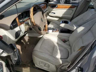 2004 Jaguar XJ VDP with VIN SAJWA74C94SG23829, listed as a Copart auction lot 82214944 with 126,887 mi miles and Salvage Title. Bid and sale history available at carsss.com. Image 7.