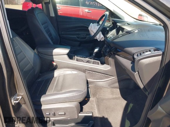 2018 Ford Escape Titanium with VIN 1FMCU0J99JUB09562, listed as a IAAI auction lot 41547659 with 63,700 mi miles and . Bid and sale history available at DreamBid. Image 5.