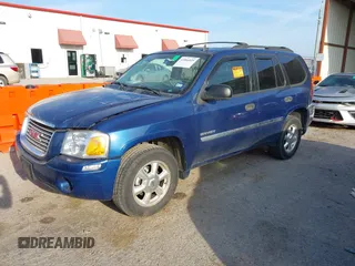 2006 GMC Envoy SLE with VIN 1GKDS13SX62315193, listed as a IAAI auction lot 41866029 with 231,164 mi miles. Bid and sale history available at carsss.com. Image 2.