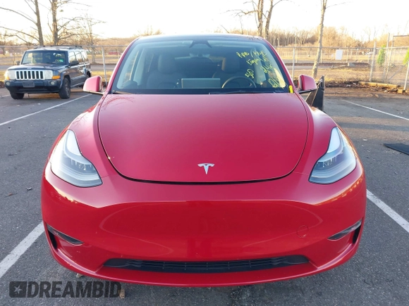 2023 Tesla Model Y Long Range with VIN 7SAYGDEE1PF860207, listed as a IAAI auction lot 41101287 with 24,320 mi miles. Bid and sale history available at carsss.com. Image 12.