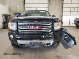 2015 GMC Canyon 4WD SLE with VIN 1GTH6BE32F1168788, listed as a Copart auction lot 76972934 with 158,562 mi miles and Salvage Title. Bid and sale history available at carsss.com. Image 5.