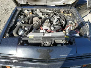 1987 Chrysler Conquest z VIN JJ3CC54N1HZ023316, wystawiony jako Copart lot #83362964 z przebiegiem 196 755 mil mil oraz Szkody całkowita. Historia ofert i sprzedaży dostępna na DreamBid. Obrazek 11.