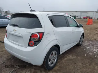 2015 Chevrolet Sonic LS with VIN 1G1JA6SH3F4160438, listed as a IAAI auction lot 41230481 with 98,424 mi miles and . Bid and sale history available at DreamBid. Image 4.