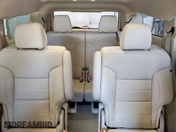2023 GMC Acadia Denali with VIN 1GKKNPLSXPZ195597, listed as a Copart auction lot 61125815 with 7,564 mi miles and Salvage title. Bid and sale history available at DreamBid. Image 10.