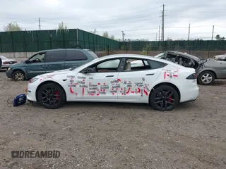 2023 Tesla Model S Plaid with VIN 5YJSA1E68PF507197, listed as a IAAI auction lot 42062258 with Not provided miles and . Bid and sale history available at DreamBid. Image 14.
