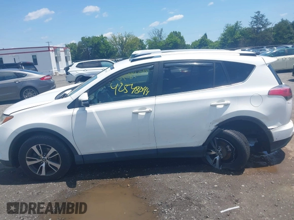 2016 Toyota RAV4 XLE with VIN JTMRFREV0GJ073114, listed as a IAAI auction lot 42548094 with 119,431 mi miles and . Bid and sale history available at DreamBid. Image 14.