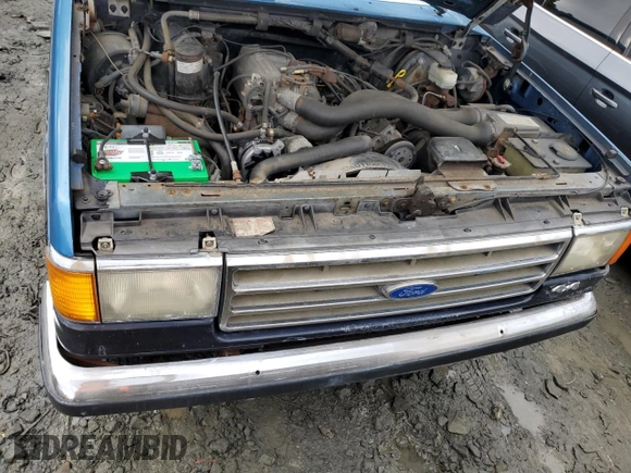 1989 Ford Bronco Custom z VIN 1FMEU15H6KLA27263, wystawiony jako Copart lot #73462704 z przebiegiem 88 209 mil mil oraz Szkoda całkowita • Salvage title. Historia ofert i sprzedaży dostępna na DreamBid. Obrazek 11.