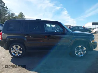 2014 Jeep Patriot High Altitude with VIN 1C4NJPFA7ED851059, listed as a IAAI auction lot 41306629 with 156,270 mi miles and . Bid and sale history available at carsss.com. Image 13.