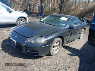 1999 Mitsubishi 3000GT GT z VIN JA3AM84JXXY001953, wystawiony jako IAAI lot #41834925 z przebiegiem 132 335 mil mil oraz . Historia ofert i sprzedaży dostępna na DreamBid. Obrazek 2.