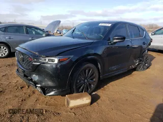2022 Mazda CX-5 2.5 Turbo with VIN JM3KFBAY5N0647340, listed as a Copart auction lot 85123474 with 68,510 mi miles and Salvage Title. Bid and sale history available at carsss.com. Image 1.