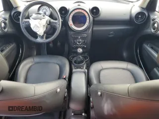 2013 MINI Countryman with VIN WMWZB3C5XDWM31715, listed as a Copart auction lot 57028565 with 95,453 mi miles and Salvage title. Bid and sale history available at DreamBid. Image 8.
