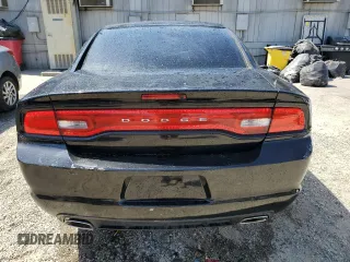 2013 Dodge Charger SE z VIN 2C3CDXBG6DH509939, wystawiony jako Copart lot #57851415 z przebiegiem 182 634 mil mil oraz Szkody całkowita. Historia ofert i sprzedaży dostępna na DreamBid. Obrazek 6.