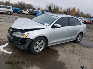 2012 Volkswagen Jetta Sedan TDI with VIN 3VW3L7AJ0CM089765, listed as a Copart auction lot 82358034 with 144,648 mi miles and Salvage Title. Bid and sale history available at carsss.com. Image 1.